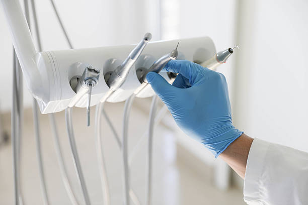 Professional Tooth Extraction technician working in Hennessey, OK